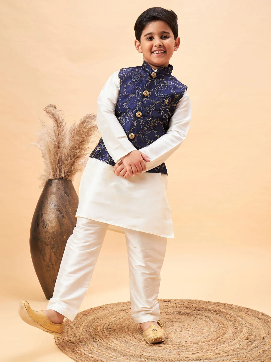 Vastramay Boy's Navy Blue Nehru Jacket With Cream Kurta And Pyjama Set