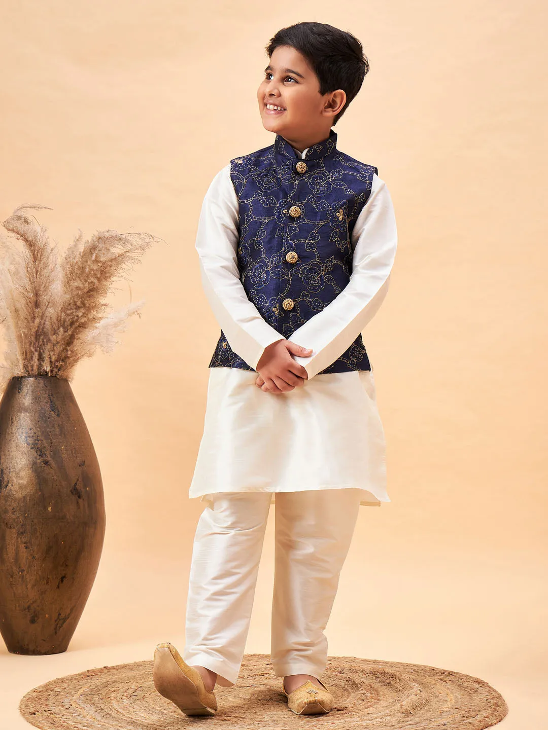 Vastramay Boy's Navy Blue Nehru Jacket With Cream Kurta And Pyjama Set